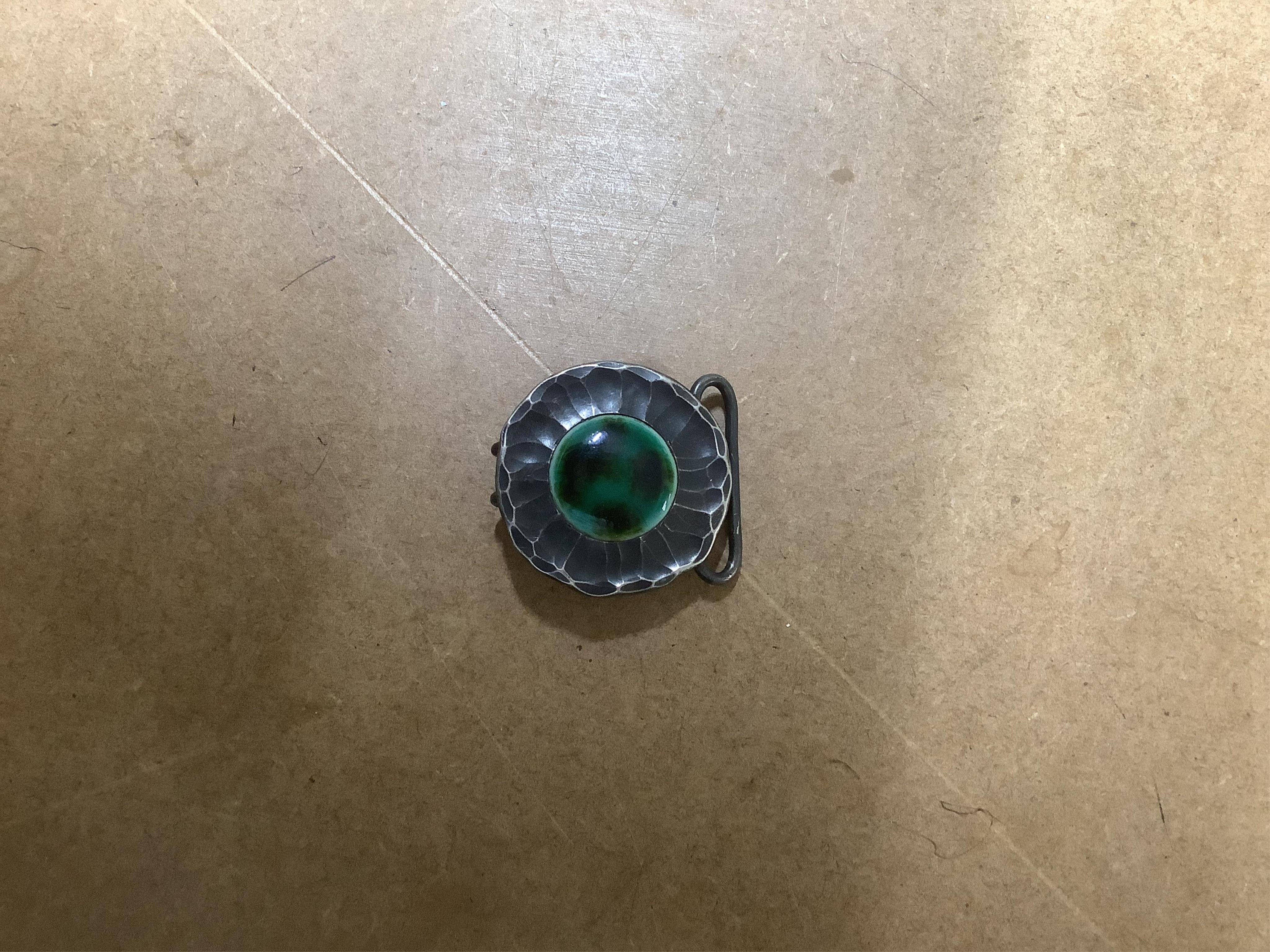A large quantity of assorted costume jewellery including necklaces, cufflinks, brooches etc. including one part of a Arts & Crafts pewter and Ruskin enamel belt buckle by Norman & Ernest Spittle for the Guild Button and